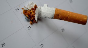 STOP pour dénoncer les pratiques de l’industrie du tabac STOP tabac ONG lutte anti-tabac cigarette
