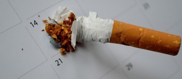 STOP pour dénoncer les pratiques de l’industrie du tabac STOP tabac ONG lutte anti-tabac cigarette