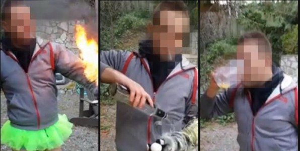 Un jeune homme mettant le feu  sa veste avant de boire son verre.